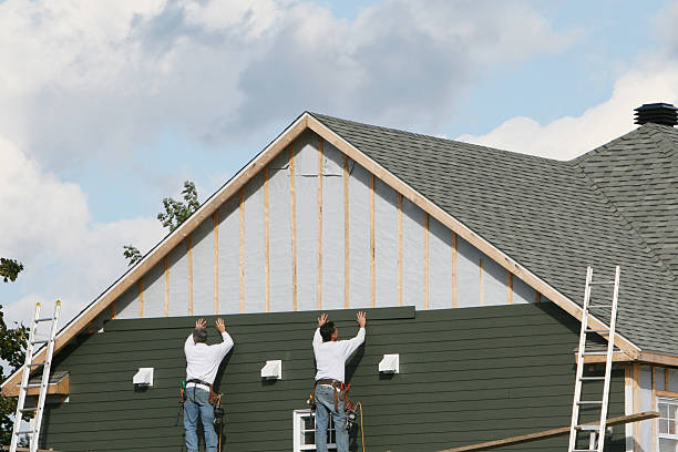 Professional Siding technician working in Sandston, VA